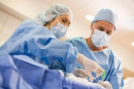 Surgeons performing a plastic surgey